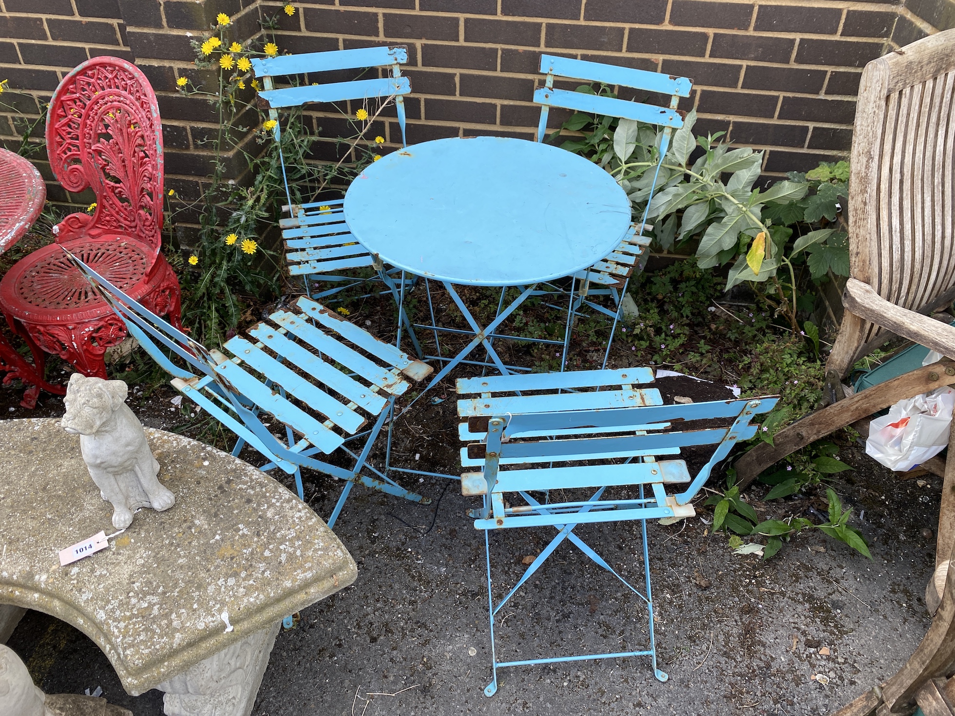 A circular metal folding garden table, diameter 60cm, height 71cm, and four folding chairs